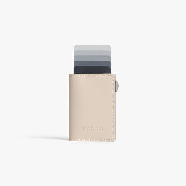 Ivory / Brushed Silver | Front view of Slim Wallet Pro with cards in Ivory / Brushed Silver